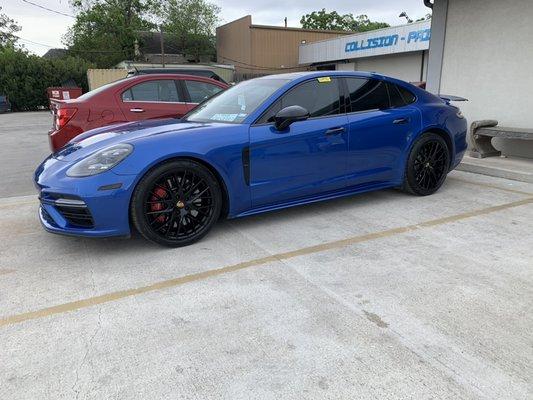 PANAMERA THAT JUST COMPLETED SOME PAINT AND BODY WORK WITH POWDER COAT OF WHEELS