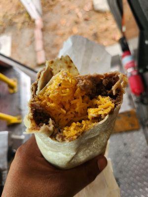 A disgusting burrito with way too much cheese that it didn't even melt.