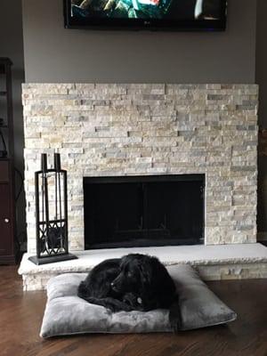 Finished fireplace with new stone and hearth.