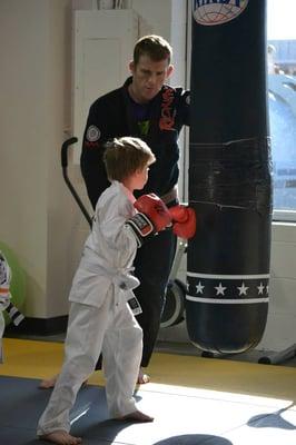 Kids working their boxing skills at Crazy 88's Kids martial arts class