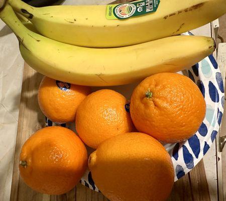 Fresh fruit- oranges and bananas.