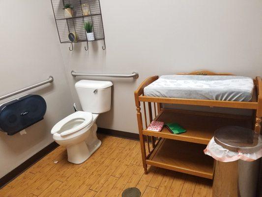 I LOVE that there is a full cozy changing table in the ladies room! How thoughtful!