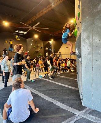 There are a number of young adults that are climbers.