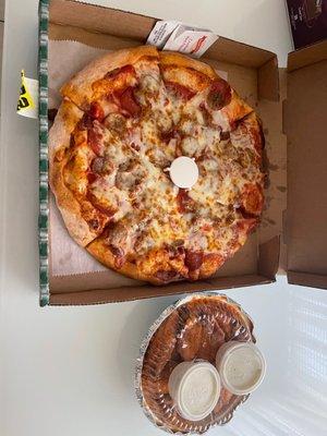 Medium pie with extra cheese and pepperoni.  Wings.