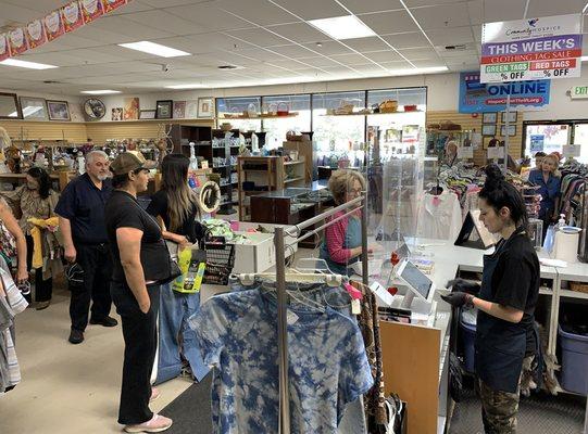 Customers wait to pay for their purchases at Community Hospice Hope Chest, Ceres pictured 6.14.23.