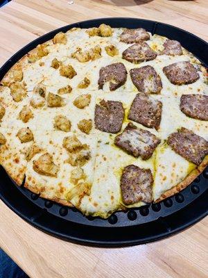 Half coconut shrimp, half lamb meatball pizza