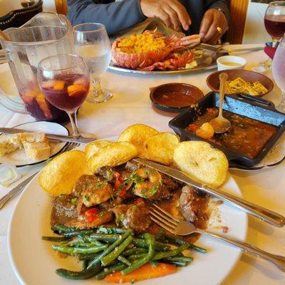 Best red sangria anywhere!  Lovely filet mignon tips with garlic shrimp