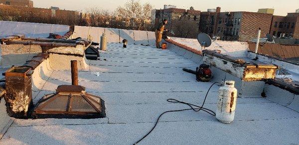 Forest Avenue Bronx Firestone 180 white Cap sheet layer over roof