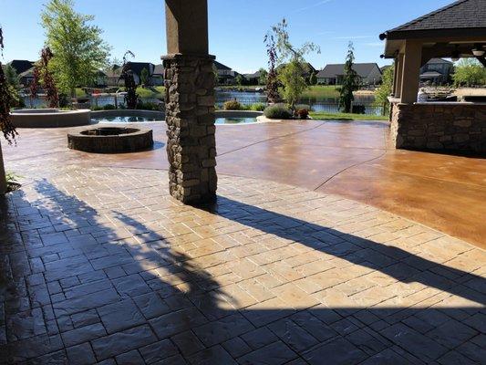 Concrete staining and topcoat application