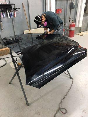 We always sweat the details. Mercedes hood being polished to a mirror finish.