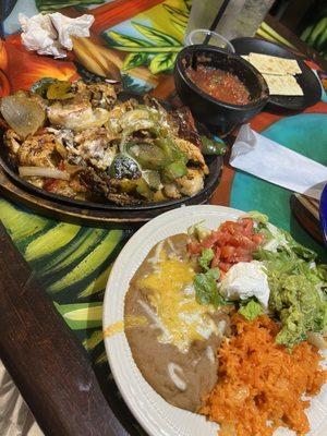 Steak, chicken and shrimp fajitas ("cowboy fajitas," I think?) the rice is INCREDIBLE btw