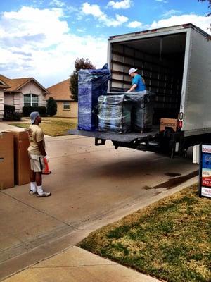 Gary & Nic loading our truck.