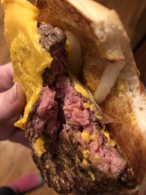 Quarter pounder burger still raw