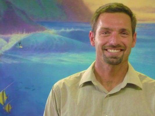 Dr. Lloyd and his cool surf mural in waiting room.