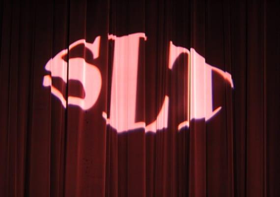 Logo on the curtain in the auditorium