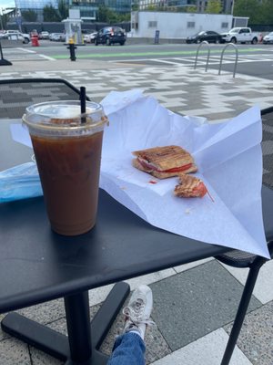 Iced latte and caprese sandwich