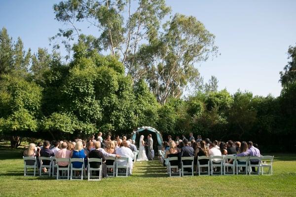 We can accommodate a large amount of chair rentals in San Diego, as evidenced by this gorgeous wedding photo.