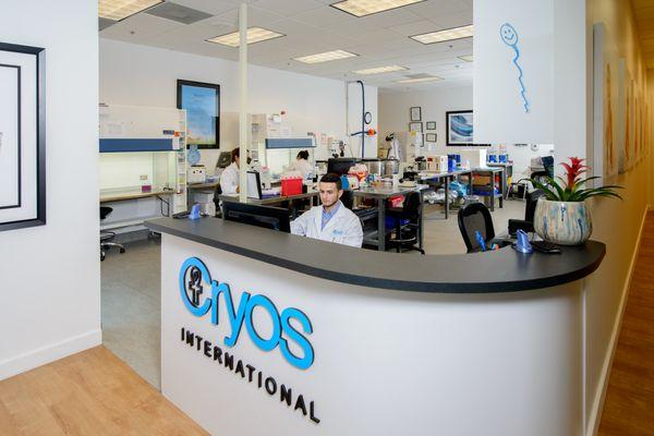 The front desk of Cryos International Sperm Bank with views of our sperm lab