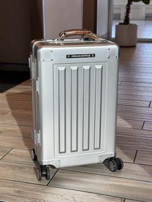 Travel in style with this all aluminum carry on case with Full Grain Italian leather