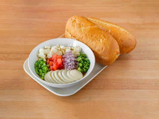 Special Ful
(fava beans + spices + tomato + green onion + red onion + jalapeno + hard boiled egg + feta cheese served with roll of bread)