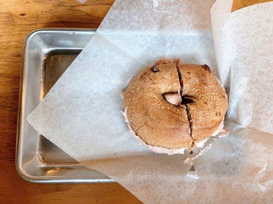 Cinnamon raisin bagel with seasonal sweet berry spread