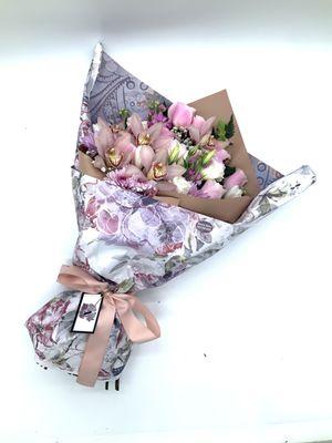 Custom bouquet designed  with pink roses Lisianthus Cymbidium orchid