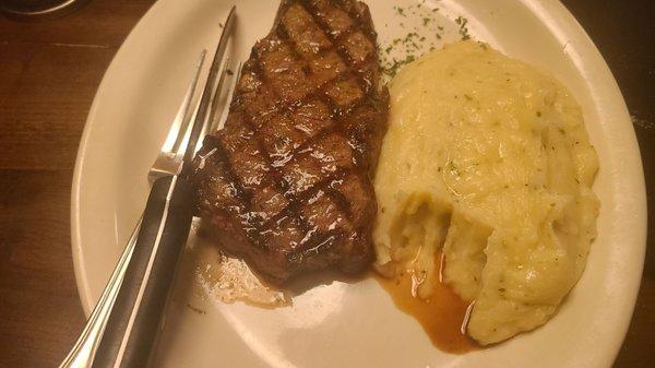 My meal, a NY Strip and garlic mashed potatoes.