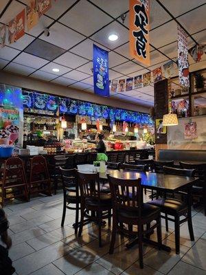 Dining area with a view of the sushi bar.