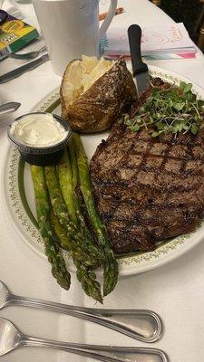 Delicious Ribeye with baked potato & asparagus! Two thumbs way up