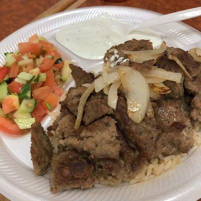 Gyro plate with salad and rice. Comes with a generous side of tzatziki.  Good stuff.