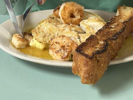 Grilled cod and shrimp with asparagus, garlic butter polenta and house made bread