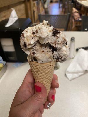 Ice cream cone with a single scoop