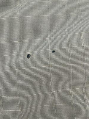 Holes in my husband's shirt!