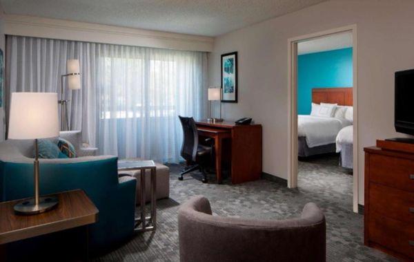 Suites are small upgrade fee  ( = Embassy Suites in Value ) So check for best deal on either if sweet Tooth for Suites- ;)