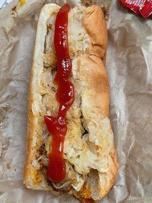 Chili dog w/kraut and ketchup