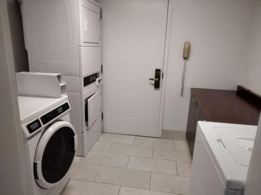 self-service laundry,washer dryer room for hotel guests