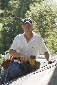 Dan Kerr on a roofing job in Fishers' Landing.