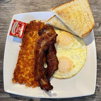 Delicious bacon & eggs w/sourdough toast. Perfect bacon & crispy hash-browns.