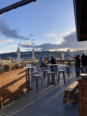 Rooftop with a view of downtown and the river! This spot could make for a romantic date or a photo spot when you're out for girls night!