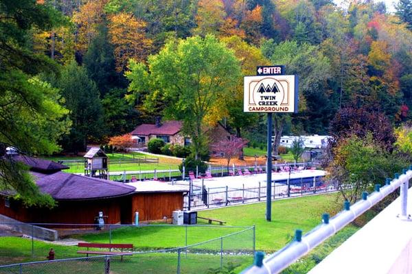 Sign, Fenced Pet Area & Pools.  Entrance is accross the street from Food City.