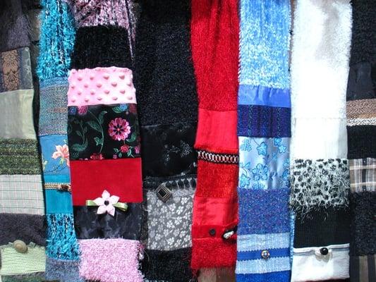 Amazing handmade scarves made from a variety of lush & silky fabrics....perfect to wrap up in & deck out a winter coat!