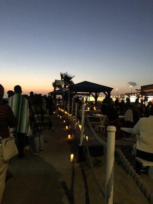 Line outside the seating area for the Candle Light  String Quartet 05/27/21