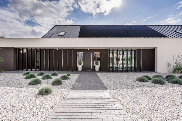 Metal Rooftop with Solar Panels Installed by Caliber Roofing Services