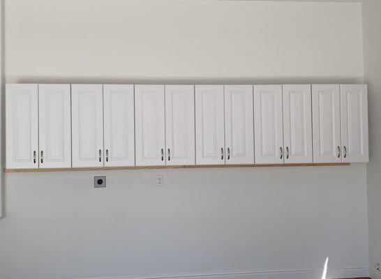 Installed garage cabinets.