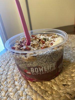 Medium Bowl with Acai and Dragon Fruit scoops. Chia pudding, bananas, kiwi, Gogi berries, almonds, almond butter, and honey.