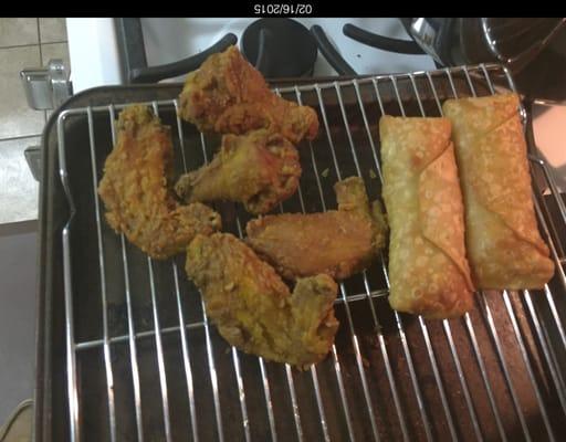 Wings & Shrimp Egg Rolls, ready to be popped in the oven to stay warm.