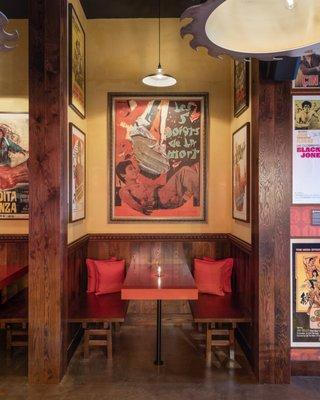 Flying Guillotine bar seating area with martial arts memorabilia