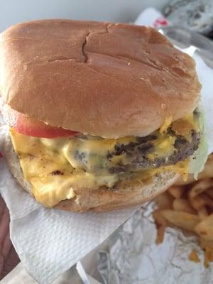 Double Cheeseburger with lettuce, tomato, onion