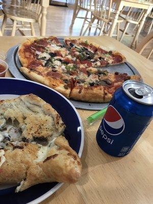 Deluxe Calzone and Deluxe Pizza