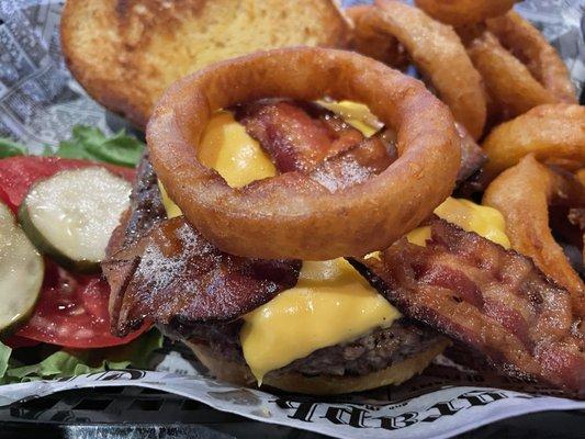 Northside Burger w/onion rings. Bacon was cooked perfectly; very crispy. Loved it all.